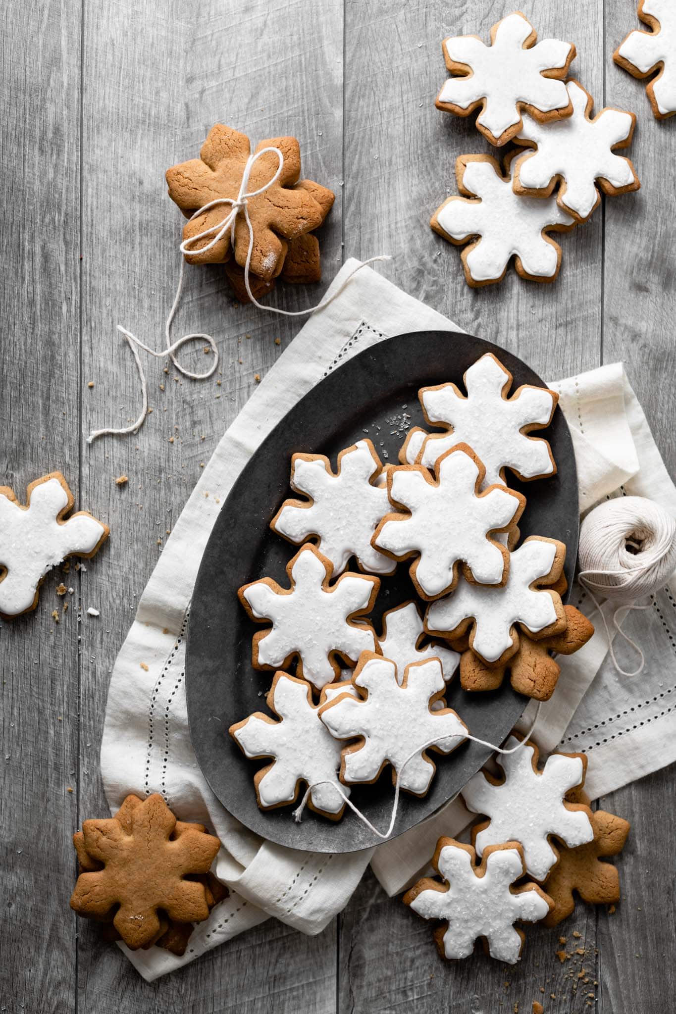 Maple syrup cookies shaped like christmas snowflake cookies