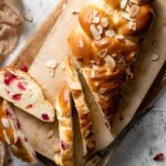 Sliced Cranberry challah bread with sliced almonds