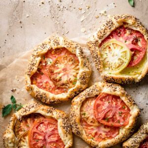 Savory Pies made with tomato and goat cheese.