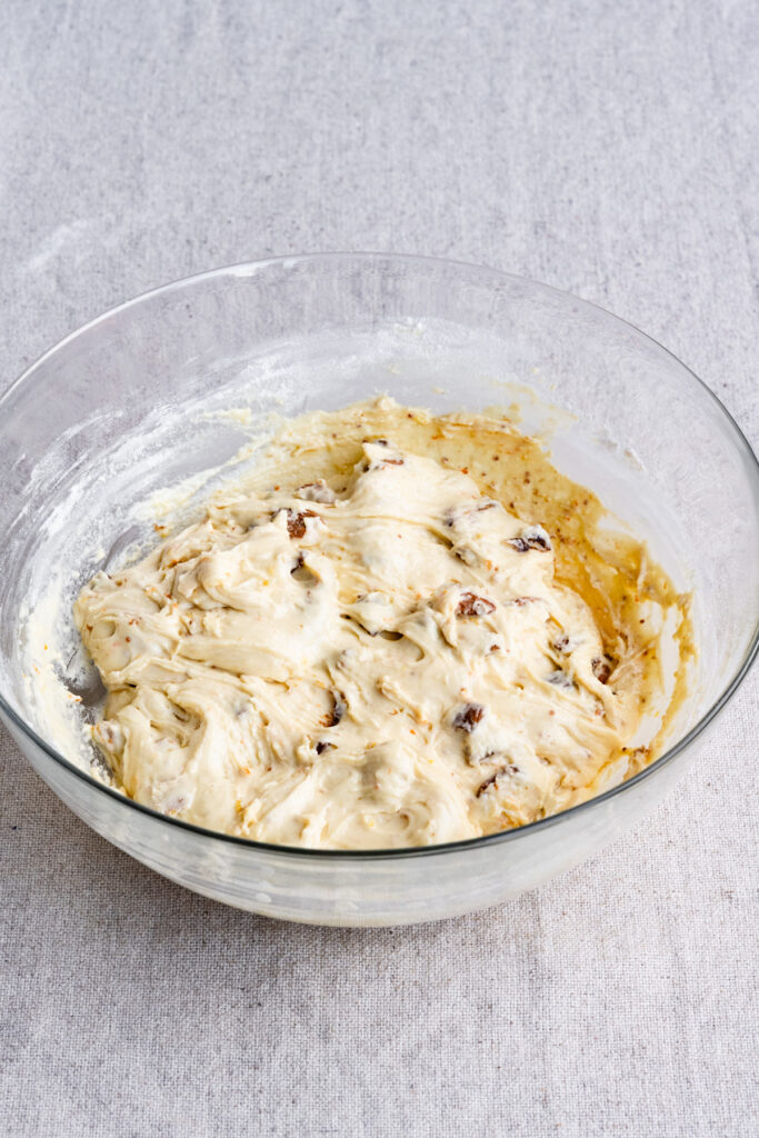 Fig and almond biscotti dough in a large bowl.