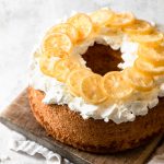 Angel food cake recipe topped with candied lemons.