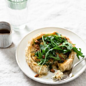 Spinach quiche recipe with arugula salad.