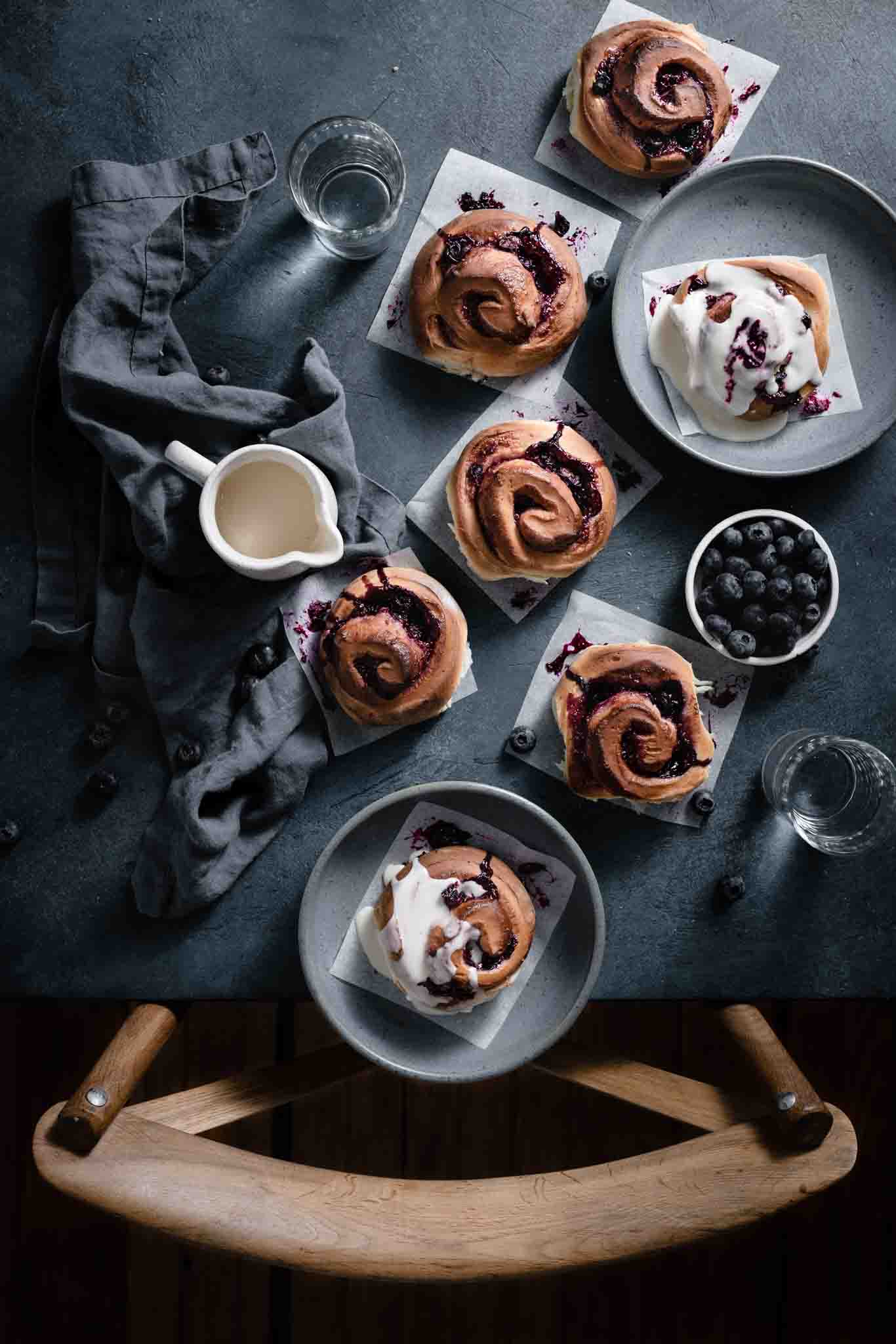 Mixed Berry Sweet Rolls with blueberries and raspberry preserves.