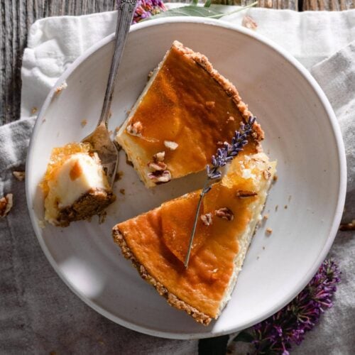 Slice honey cheesecake with pecans.
