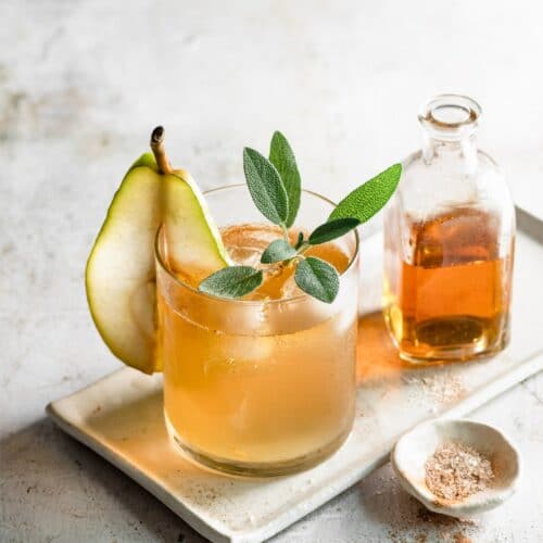 Pear Cocktail with a glass of bourbon.