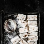 Tray of sliced homemade marshmallows .
