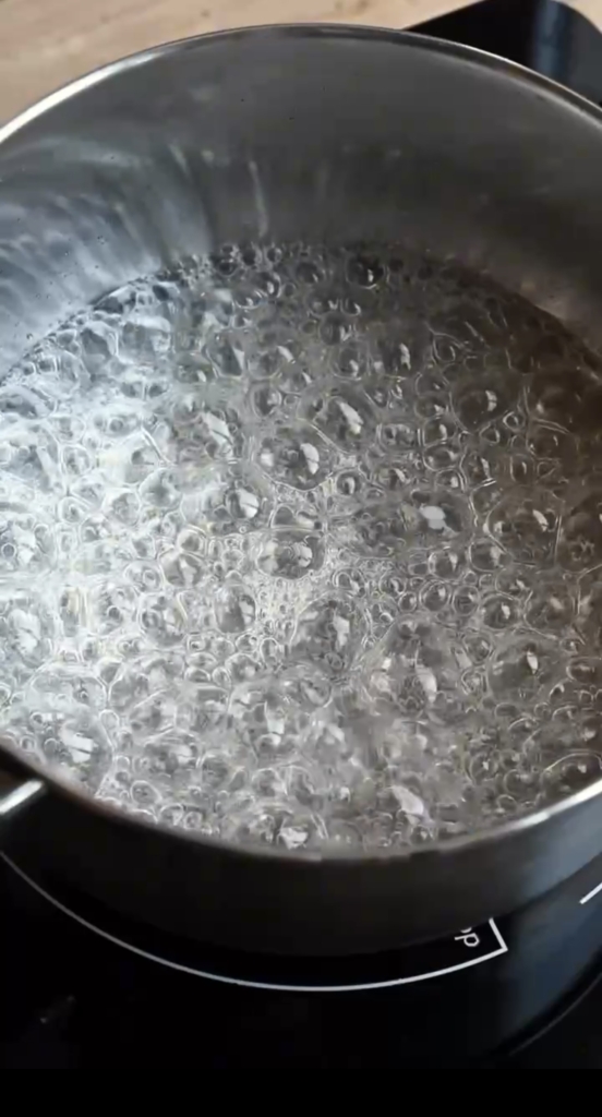 A pot of boiling sugar water.