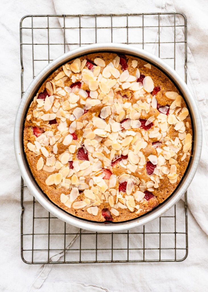 Overhead of baked strawberry almond cake. 