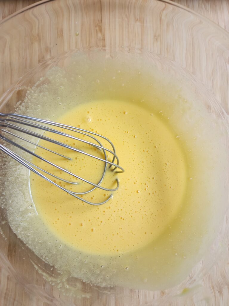 Egg yolks and sugar whisked together until foamy and pale.