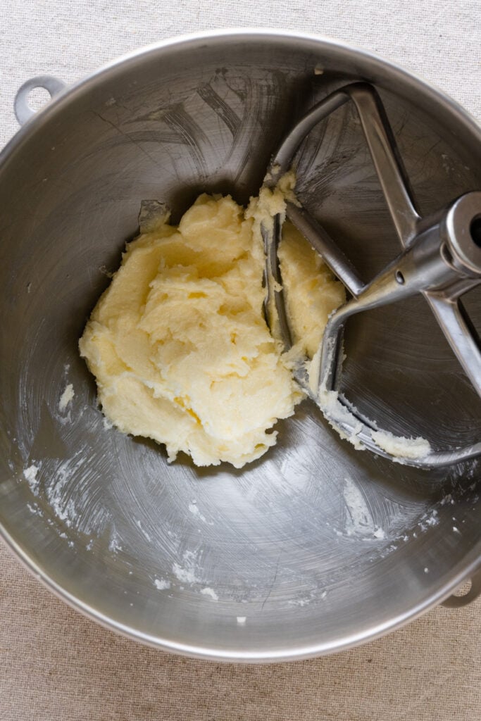Creamed butter and sugar in the bowl of a stand mixer.