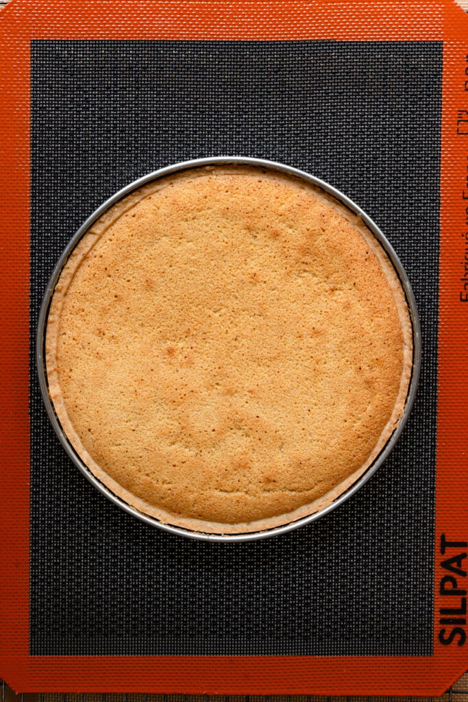 Overhead of almond cream baked inside a tart shell.