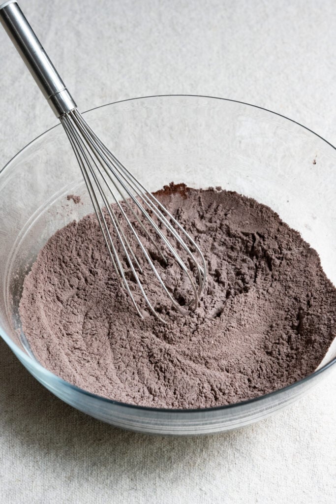 Whisk in a bowl of flour and cocoa powder.