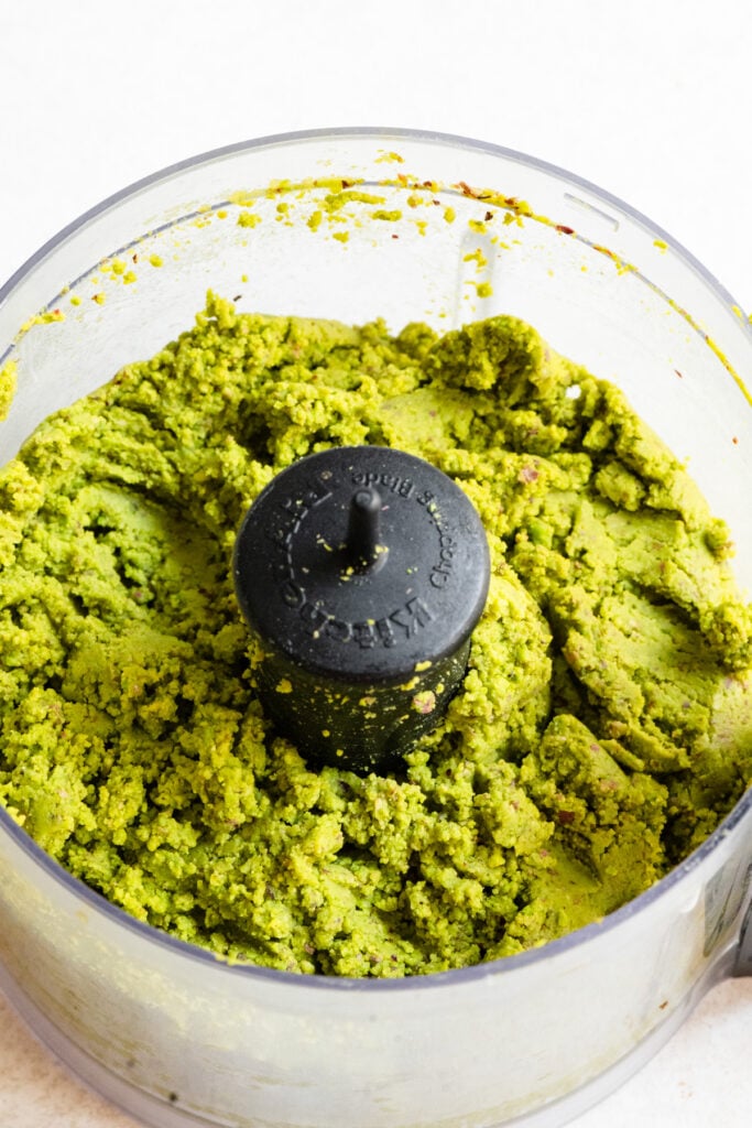 Pistachio paste inside a food processor.