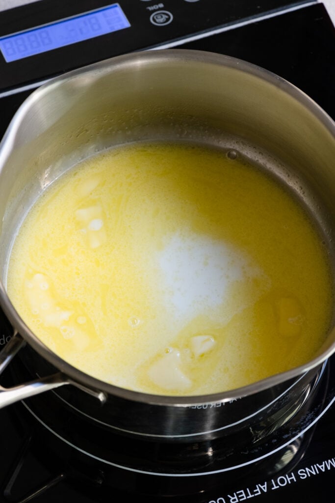 Melted butter and milk in a saucepan.